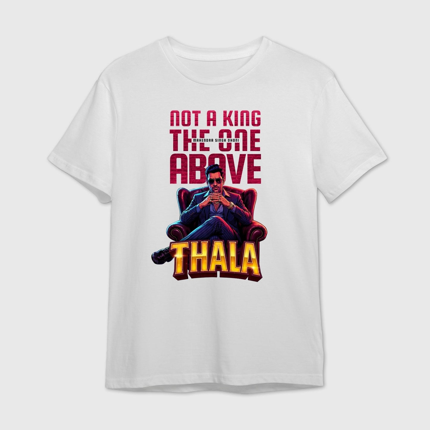 White t-shirt with a graphic design featuring text 'Thala' and an image of a MS Dhoni sitting on a chair.