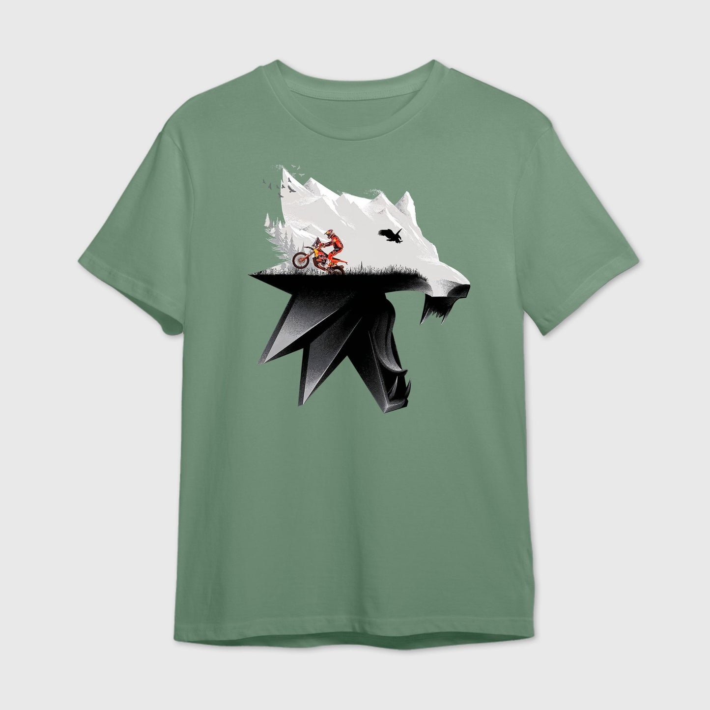 Sage green t-shirt with mountain peaks and rally racing blended within a fierce wolf face 